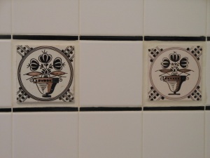 18th century tiles I bought in Delft the year we moved in to the house. I love the differences you can see even though they were both made from the same design template.